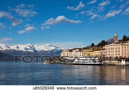 Stock Photo - Ferry moored at lakeside, Lake Como, Italy. Fotosearch