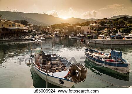Picture - Fishing boats in traditional harbour, Centuri, Corsica, France. Fotosearch