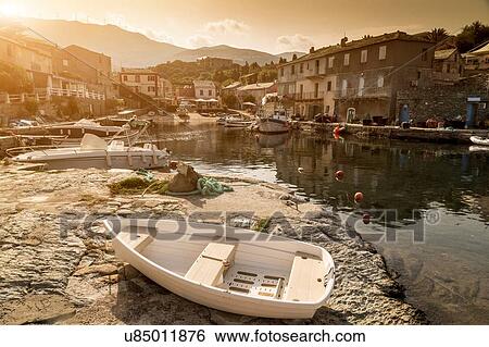 Fishing boats moored in traditional harbour, Centuri, Corsica, France View Large Photo Image Stock Photograph - Fishing boats moored in traditional harbour, Centuri, Corsica, France. Fotosearch