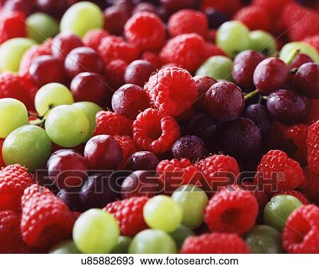 Fresh raspberries, red and green grapes View Large Photo Image Stock Image - Fresh raspberries, red and green grapes. Fotosearch