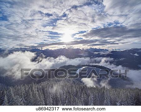 High angle view of misty mountain forest landscape, Ammergauer Alps, Oberammergau, Bavaria, Germany View Large Photo Image Stock Photo - High angle view of misty mountain forest landscape, Ammergauer Alps, Oberammergau, Bavaria, Germany. Fotosearch