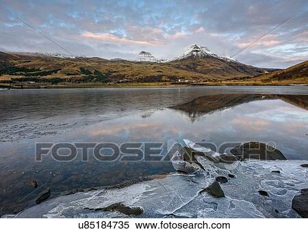 Landscape view of lake ice and mount Esja, Reykjavik, Iceland View Large Photo Image Stock Photography - Landscape view of lake ice and mount Esja, Reykjavik, Iceland. Fotosearch