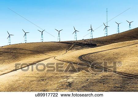 Low angle view of wind turbines on rolling landscape, California, USA View Large Photo Image Stock Image - Low angle view of wind turbines on rolling landscape, California, USA. Fotosearch