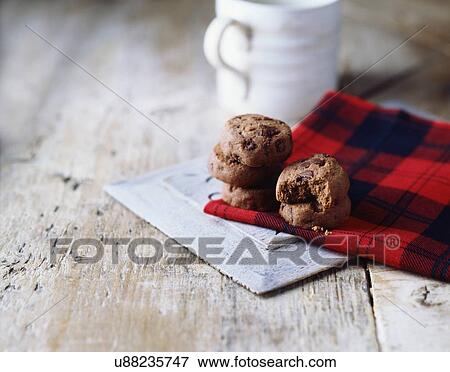Luxury chocolate chip cookies on tartan tea towel View Large Photo Image Stock Photo - Luxury chocolate chip cookies on tartan tea towel. Fotosearch