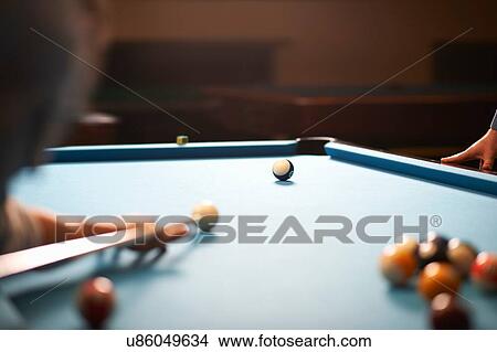 Man playing pool View Large Photo Image Picture - Man playing pool. Fotosearch