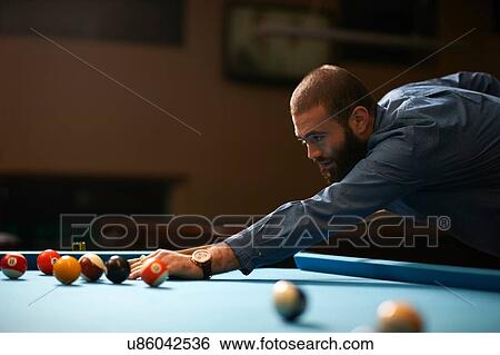 Man playing pool View Large Photo Image Stock Photograph - Man playing pool. Fotosearch