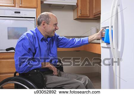 Man with deformed hands in the kitchen View Large Photo Image Stock Image - Man with deformed hands in the kitchen. Fotosearch