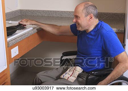 Man with deformed hands in the kitchen View Large Photo Image Stock Photo - Man with deformed hands in the kitchen. Fotosearch