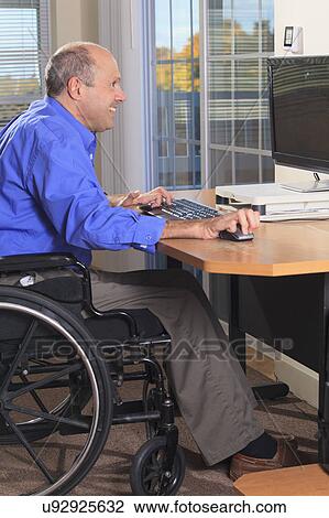 Man with deformed hands using a computer View Large Photo Image Stock Image - Man with deformed hands using a computer. Fotosearch