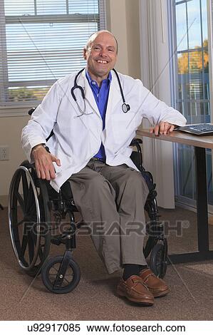 Stock Photography - Man with deformed hands working as doctor. Fotosearch