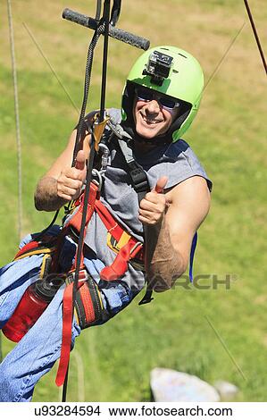 Man with spinal cord injury rock climbing View Large Photo Image Picture - Man with spinal cord injury rock climbing. Fotosearch