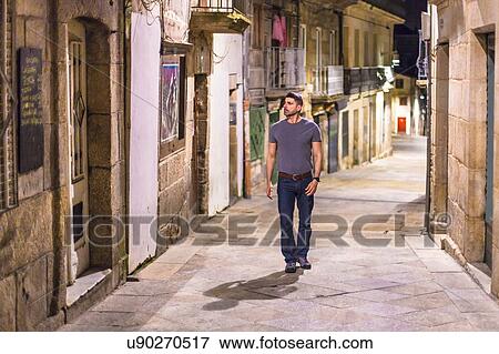 Mature man walking along street, Vigo, Spain View Large Photo Image Stock Photo - Mature man walking along street, Vigo, Spain. Fotosearch