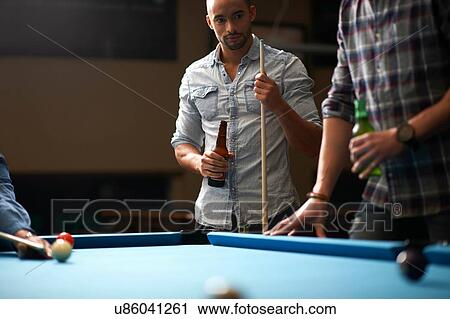Men with beer standing at pool table View Large Photo Image Stock Image - Men with beer standing at pool table. Fotosearch