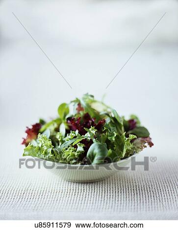 Stock Photo - Mixed leaf salad in bowl. Fotosearch