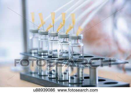 Oil samples being tested in laboratory, close up View Large Photo Image Stock Photograph - Oil samples being tested in laboratory, close up. Fotosearch