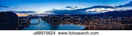 Picture - Panoramic high angle view of Lake Lugano at dusk, Switzerland. Fotosearch