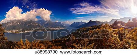 Stock Image - Panoramic landscape of mountains and lake, Civenna, Lombardy, Italy. Fotosearch