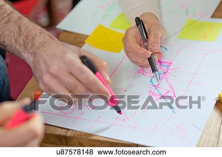 People writing on paper View Large Photo Image Stock Photo - People writing on paper. Fotosearch