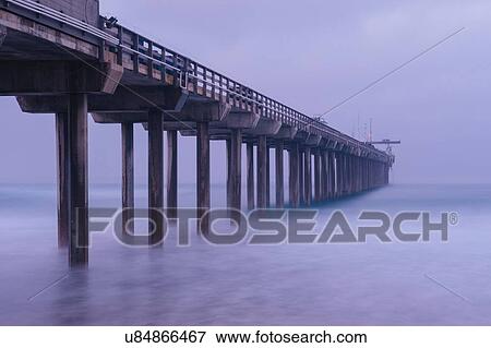 Stock Photo - "Pier over misty water, San Diego, California, USA". Fotosearch