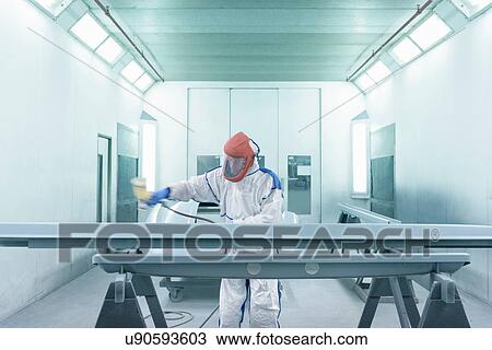 Portrait of worker paint spraying parts on automotive production line View Large Photo Image Stock Image - Portrait of worker paint spraying parts on automotive production line. Fotosearch