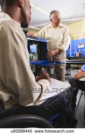 Professor and one student in wheelchair View Large Photo Image Stock Photography - Professor and one student in wheelchair. Fotosearch