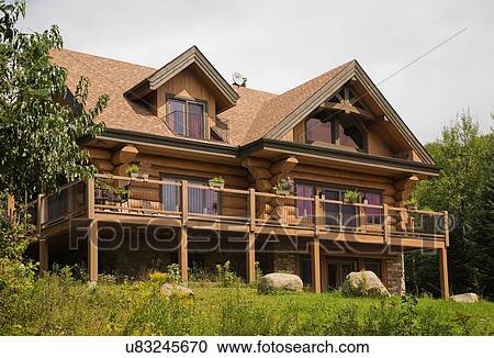 Rear of Scandinavian cottage style log home and garden View Large Photo Image Stock Image - Rear of Scandinavian cottage style log home and garden. Fotosearch