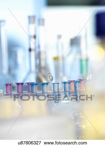 Stock Photo - Sample in eppendorf vial during experiment in laboratory. Fotosearch