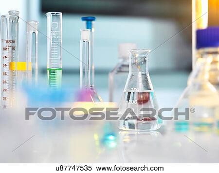 Scientific apparatus and glassware on laboratory bench awaiting experiment View Large Photo Image Stock Photography - Scientific apparatus and glassware on laboratory bench awaiting experiment. Fotosearch