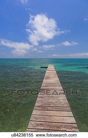 "Seascape and wooden pier, St. Georges Caye, Belize, Central America" View Large Photo Image Stock Photography - "Seascape and wooden pier, St. Georges Caye, Belize, Central America". Fotosearch