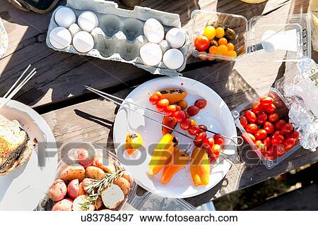 "Selection of fresh food on picnic table, overhead view" View Large Photo Image Stock Photo - "Selection of fresh food on picnic table, overhead view". Fotosearch