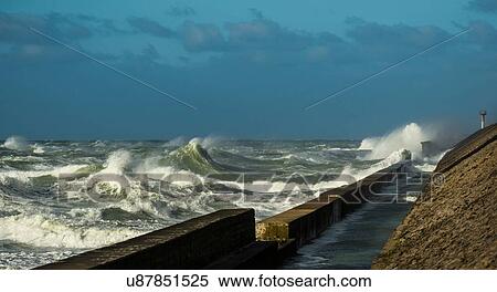 Stormy ocean waves splashing harbour wall, Boulogne-sur-Mer, Pas de Calais, France View Large Photo Image Stock Photography - Stormy ocean waves splashing harbour wall, Boulogne-sur-Mer, Pas de Calais, France. Fotosearch