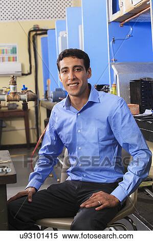 Stock Photography - Student in laboratory. Fotosearch