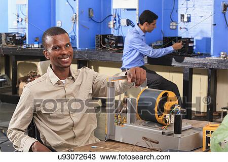 Stock Image - Student in wheelchair. Fotosearch