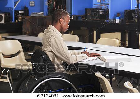 Stock Image - Student in wheelchair. Fotosearch