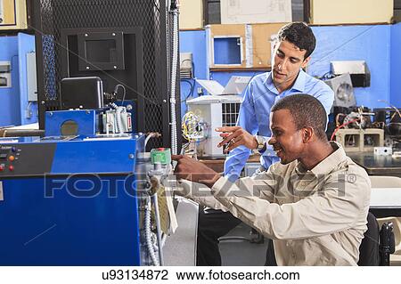 Stock Image - Student in wheelchair. Fotosearch