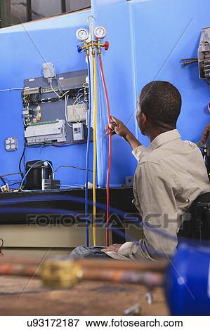 Stock Photo - Student in wheelchair. Fotosearch