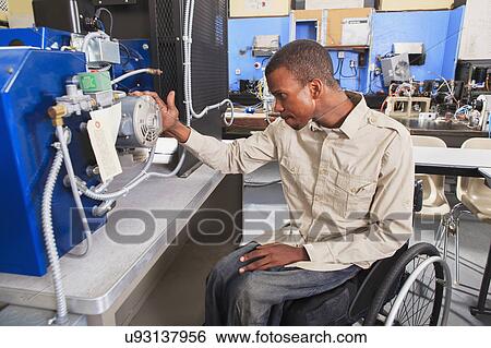 Stock Photograph - Student in wheelchair. Fotosearch