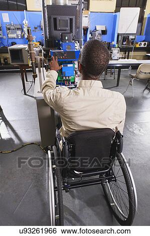 Stock Photograph - Student in wheelchair. Fotosearch