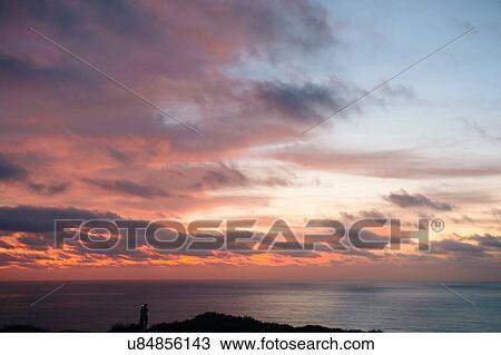 Stock Image - "Sunset over ocean, San Diego, California, USA". Fotosearch