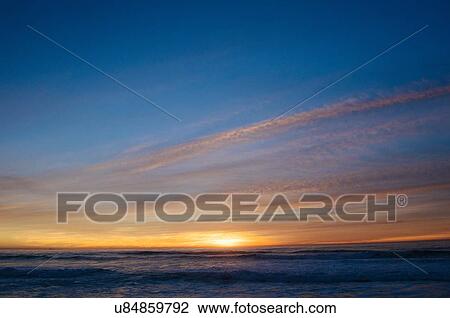 Stock Image - "Sunset over ocean, San Diego, California, USA". Fotosearch