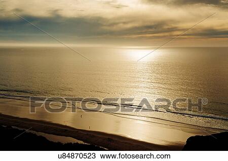 Stock Image - "Sunset over ocean, San Diego, California, USA". Fotosearch