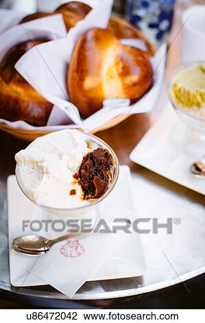 Stock Image - Tray of vanilla and coffee granita breakfast with brioche, Sicily, Italy. Fotosearch