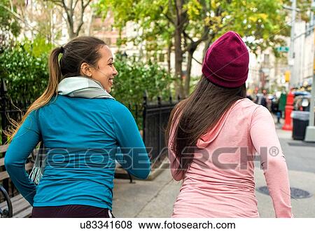 Twins jogging in park View Large Photo Image Stock Photo - Twins jogging in park. Fotosearch