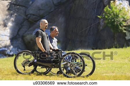 Two men with spinal cord injuries View Large Photo Image Stock Photo - Two men with spinal cord injuries. Fotosearch