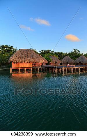 "Waterfront chalets, St. Georges Caye, Belize, Central America" View Large Photo Image Stock Photo - "Waterfront chalets, St. Georges Caye, Belize, Central America". Fotosearch