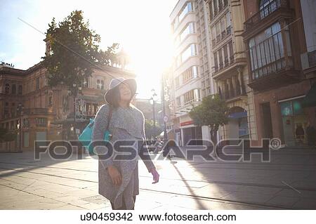 Stock Image - Woman sightseeing, Seville, Spain. Fotosearch