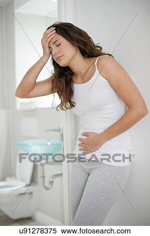 Woman with cramps View Large Photo Image Stock Photography - Woman with cramps. Fotosearch