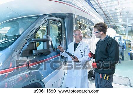 Workers inspecting vehicles on motorhome production line View Large Photo Image Stock Image - Workers inspecting vehicles on motorhome production line. Fotosearch