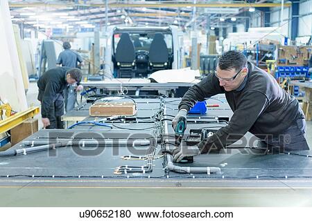 Workers on motorhome production line View Large Photo Image Stock Image - Workers on motorhome production line. Fotosearch
