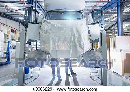 Workers on motorhome production line View Large Photo Image Stock Photo - Workers on motorhome production line. Fotosearch
